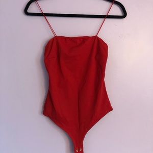 Dynamite bodysuit